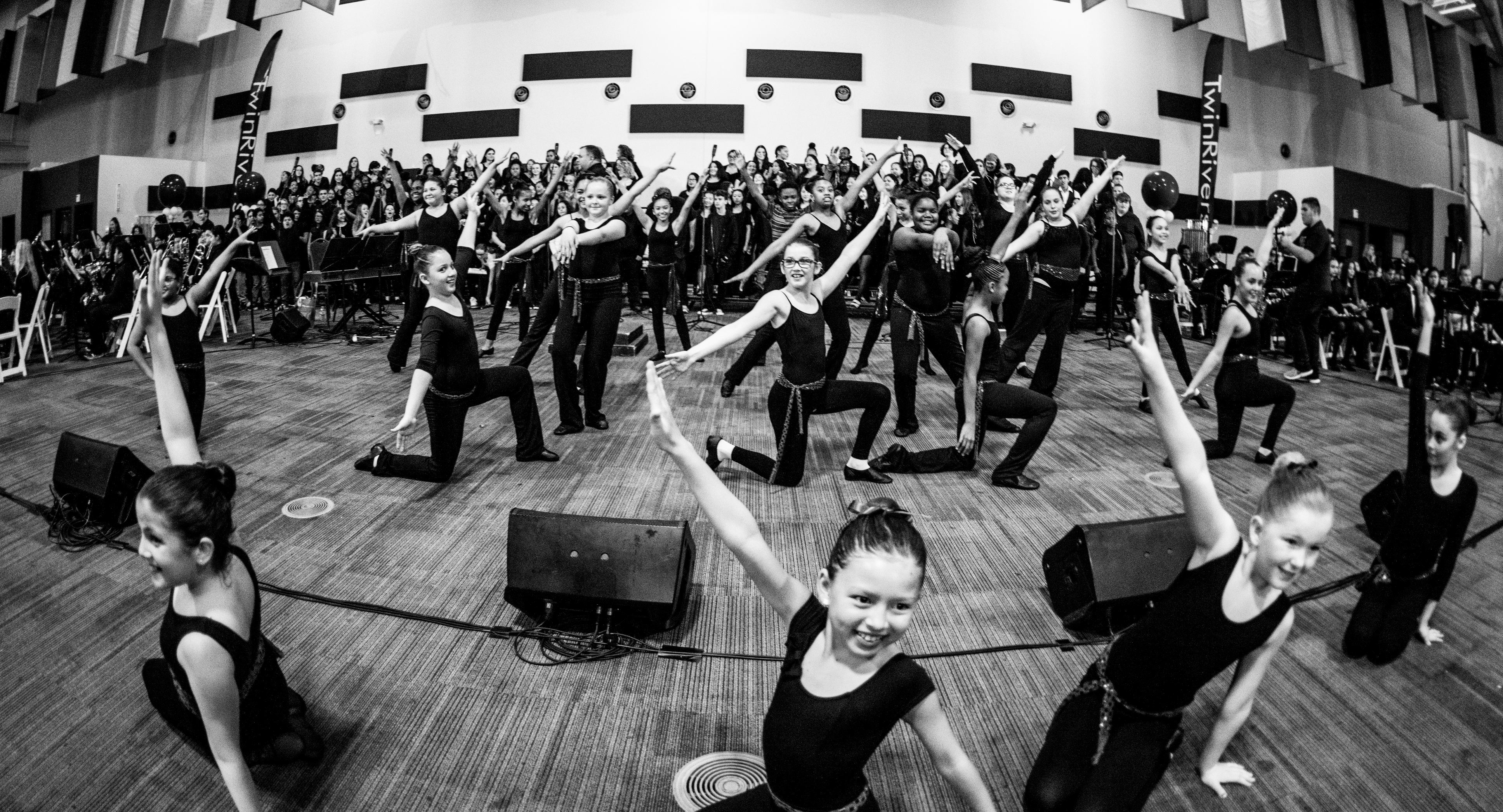 black and white of children dancing