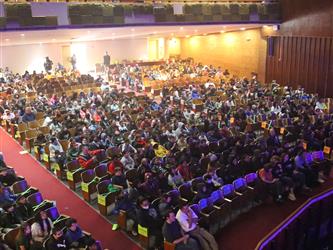 View of the student audience members in the orchestra area